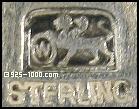 W, lion or griffin
